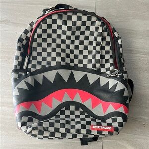Sprayground Black and Gray Checkered Backpack with Red Accents